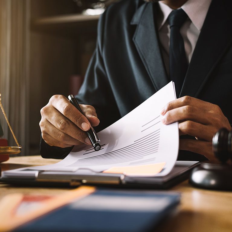 justice and law concept.Male judge in a courtroom on wooden table.